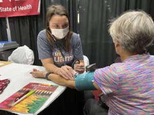 UAMS staff and students performed about 100 blood pressure and heart rate screenings during the expo. 