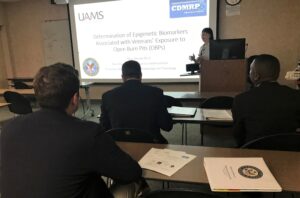 UAMS' Shuk-Mei Ho, Ph.D., provided an overview of the burn pit exposure research to members of Sen. John Boozman's staff.