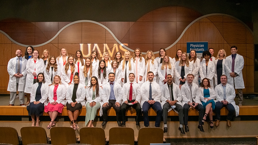 UAMS Physician Assistant Class of 2022 take a moment after the  Valediction Ceremony for one last, group photo.