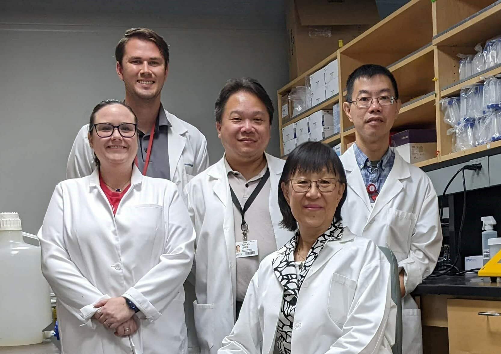 Shuk-Mei Ho, Ph.D., (front) with her lab/study team members: (second row, from left) Marybeth Shepard, technician, Ricky Leung, Ph.D., associate professor, and Neville Tam, Ph.D., assistant professor; (back) Alex McDonald, technician.