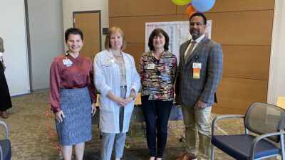 Thea Rosenbaum (from left), chief clinical transformation officer for UAMS Health; Michelle Krause, interim CEO of the UAMS Medical Center and interim senior vice chancellor for UAMS Health; Stephanie Gardner, UAMS provost and chief strategy officer; and Brian Gittens, vice chancellor of the Division for Diversity, Equity and Inclusion were among the campus leaders who attended the Pride Celebration.
