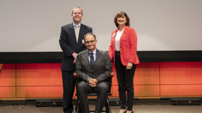 Andrew J. Morris flanked by and Cam Patterson (left) and Stephanie Gardner.