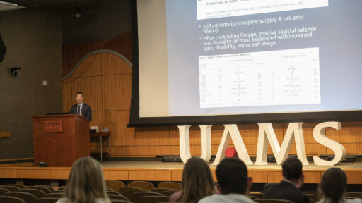 Paul Park, M.D., discusses spinal surgery during the annual Flanigan-Boop Lectureship in the Jackson T. Stephens Spine Institute.