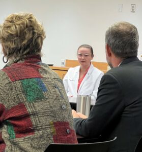 Holly Maness, a fourth-year pharmacy student answers legislators' questions.