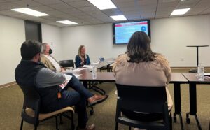 Krista Langston, executive director of community programs for the UAMS Office of Community Health & Research, gives an overview or her group's efforts to state legislators.