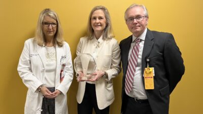 Susan Smyth, M.D., Ph.D., UAMS executive vice chancellor and dean of the College of Medicine; 2022 Distinguished Faculty Scholar Stacie M. Jones, M.D.; and Kevin Raney, Ph.D., chair of the Department of Biochemistry and Molecular Biology and chair of the Dean’s Distinguished Lecture Series Committee.
