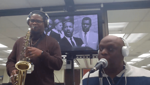 Dana McEwen (left), instrument technician for Sterile Services, and Marcus Murphy, biomedical equipment technician in the UAMS Office of Academic Services, perform a live musical rendition of Marvin Gaye’s “What’s Going On” during an event to honor the legacy of Martin Luther King Jr.