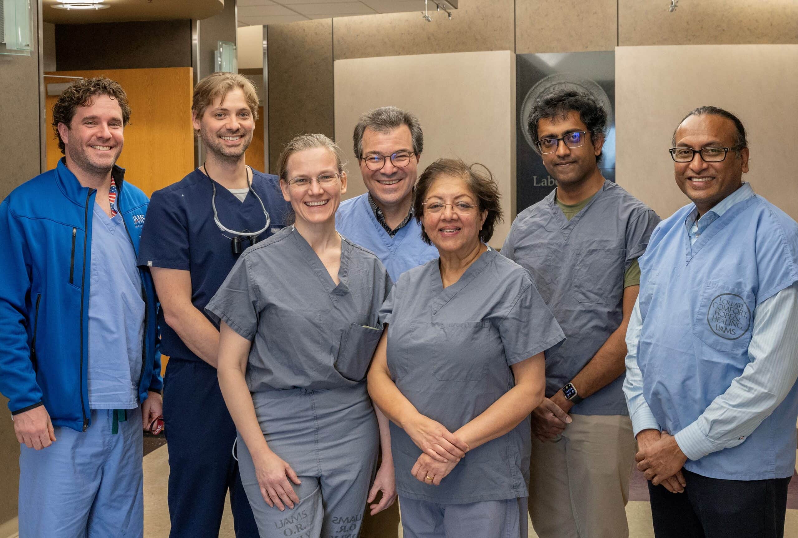 Members of the collaborating UAMS and University of Arkansas research teams for the prosthesis with the potential to provide sense of touch are (l-r) UAMS surgeons Mark Tait, M.D., John Bracey, M.D., and Erika Petersen, M.D.; and UA researchers James Abbas, Ph.D., Ranu Jung, Ph.D., Sathyakumar Kuntaegowdanahalli and Anil Thota.