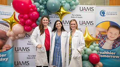 UAMS Department of Obstetrics and Gynecology physicians Laura Hollenbach, M.D., Nirvana Manning, M.D., and Kathryn Stambough, M.D., taught girls ages 8-14 at the second Girlology puberty event.