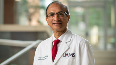 doctor standing in lobby of the cancer center