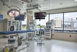 An inside view shows that surgeons have plenty of space to work and a view of the main hospital.