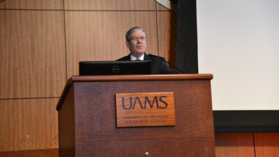 John Dornhoffer, M.D., chairman of the Department of Otolaryngology – Head and Neck Surgery in the UAMS College of Medicine, welcomes attendees from the stage on the first day of the Otolaryngology Diamond Conference.