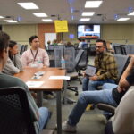 Jesus Delgado-Calle, an assistant professor of physiology and cell biology at UAMS, discusses his research with undergraduates and his team.