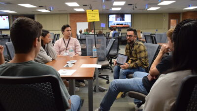 Jesus Delgado-Calle, an assistant professor of physiology and cell biology at UAMS, discusses his research with undergraduates and his team.