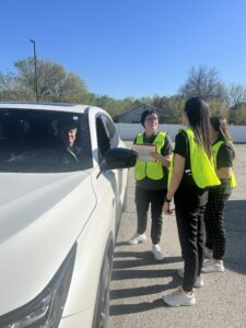 Doctor of Occupational Students being trained at a CarFit event.