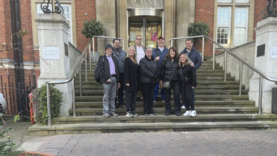 The second group of UAMS employees on the steps of the Royal Marsden Hospital.