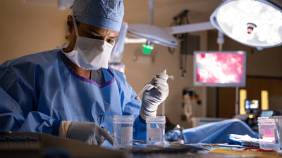 doctor performing surgery