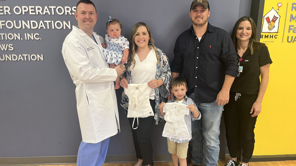 <p>Haley Clark, her husband Seth and their two children Owen and Lilly are flanked by Adam Sandlin, M.D., and his APRN, Brooke Keathley.</p>
<div><a class="more" href="https://news.uams.edu/2023/07/14/camden-mom-donates-tiny-angel-gowns-to-nicu/img_7241/">Read more</a></div>