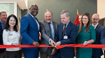 UAMS leaders, Little Rock mayor and Arkansas Governor cut a ceremonial red ribbon