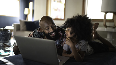 Parent and child with laptop