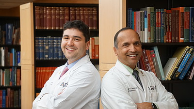 Ophthalmology is a family affair for resident Tony Chacko, M.D., (left) and his father, Joseph Chacko, M.D., director of neuro-ophthalmology at the UAMS Harvey & Bernice Jones Eye Institute.