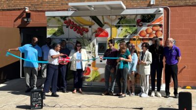 UAMS), the Northwest Arkansas Food Insecurity Community of Practice and the St. James Missionary Baptist Church and community leaders cut the ribbon at the new food lockers.