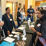 TRI's David Avery, senior director of Clinical Research Operations, and Carrie Cochran-Raglon, director of the UAMS Rural Research Network, talk with Lipika Sarangi, Ph.D. (right).
