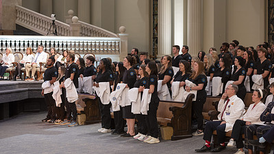 Students take part in a white coat ceremony for the College of Nursing’s BSN and graduate programs.