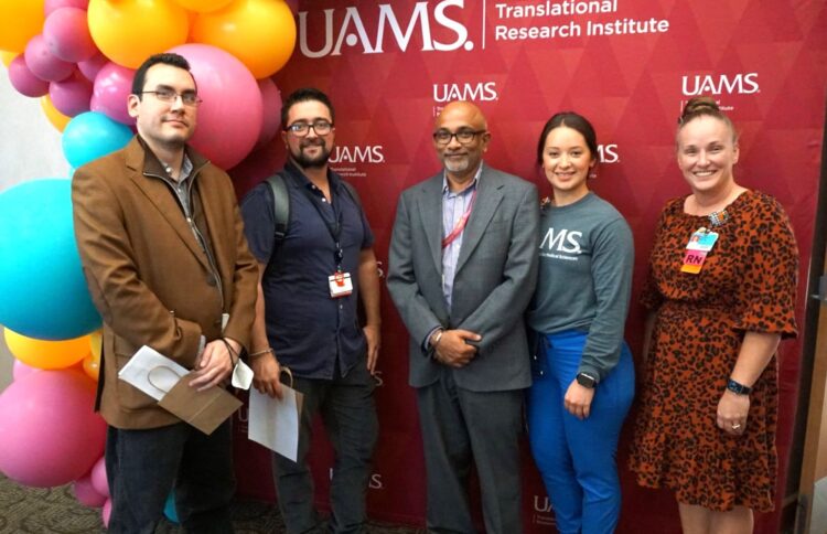 Alberto Ramirez, Ph.D., (second from left), is a member of a research team led by Hari Eswaran, Ph.D., (center).
