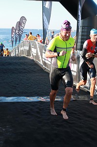 Brandon Hogge finishes the swimming portion of the Ironman World Championship in Nice, France. Photo courtesy of Finisherpix.