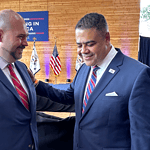 UAMS' Kevin Sexton, M.D. (left), president of BioVentures, chats with Donald “Don” Cravens Jr., under secretary of Commerce for the Minority Business Development Agency, during a ceremony at the White House to celebrate the Capital Readiness Program.
