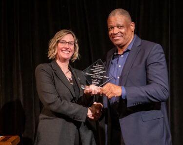 The Arkansas Community Engagement Alliance (CEAL) Coalition won the Community Advisory Board of the Year Award, received by Pastor Fred Harris. receives 