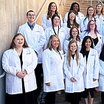 Graduates of the Medical Laboratory Sciences program gather from one last photo after the Dec. 18 graduation and awards ceremony.