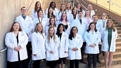 Graduates of the Medical Laboratory Sciences program gather from one last photo after the Dec. 18 graduation and awards ceremony.