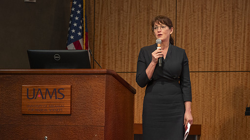Pearl McElfish, director of the UAMS Institute of Community Health Innovation, announces the establishment of the institute during a UAMS town hall.