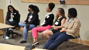 Amie Brint (from left), Raven Hinton, Clai Morehead, Brittany Montgomery and Quincy Gragg hold a panel discussion about their experiences in medical school.
