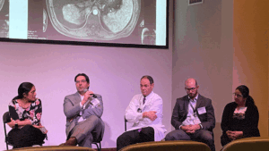 five UAMS physicians at a UAMS cancer symposium 