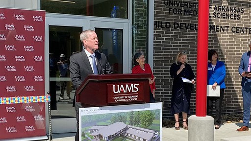 Cam Patterson, chancellor of UAMS and CEO of UAMS Health, speaks during the ribbon-cutting ceremony for the UAMS Child Development Center.