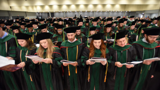 The UAMS College of Medicine Class of 2024 recites the Hippocratic Oath with Dean Steven Webber, M.D.