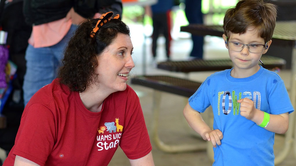 <p>Sara Peeples, M.D., medical director of the University of Arkansas for Medical Sciences (UAMS) NICU Unit, jokes with one of the children attending the 2024 UAMS NICU Reunion at the Little Rock Zoo. </p>
<div><a class="more" href="https://news.uams.edu/dsc_0044/">Read more</a></div>