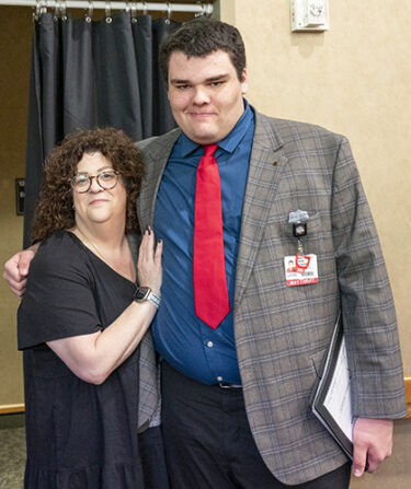 Amanda Orgel, left, and her son, Teddy Ferguson. Orgel was the keynote speaker and Ferguson was a graduate of Project SEARCH. Image by Evan Lewis