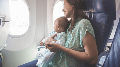 Woman and baby on a plane