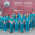 A group of high school students who attended one of UAMS' summer MASH camps