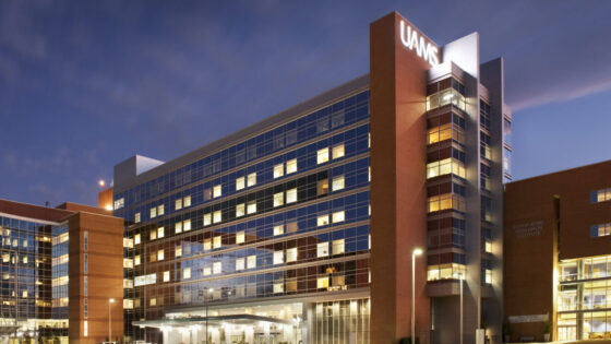 stock photo of UAMS exterior lit up at night
