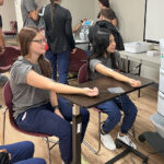 Students participating in a MASH camp event