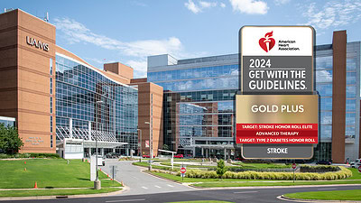 2024 Get With the Guidelines logo in front of UAMS stock photo