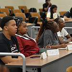 Chris Carlock (left) and other students in the HCOP Academy take part in a session on public health issues. The teens later drafted and filmed a series of public service announcements that covered topics such as mental health, opioids, pollution, sexually transmitted illnesses and vaping.