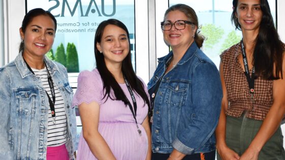 The first class of certified lactation counselors pose for a photo.