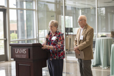 JoAnn and Richard Smith address attendees at the College of Nursing reception.