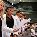 Grace Booker, Kennedi Burns, Kia Bursey-Walker reciting professionalism pledge